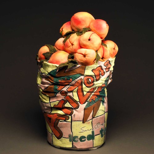 Crop of peaches in ceramics