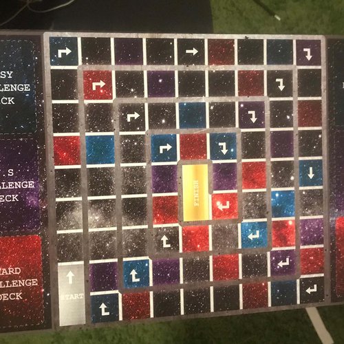 A galaxy-inspired board game by students Marissa Aventi, Henry Rivera, and Destinee Bailey for the Gaming and Play course.