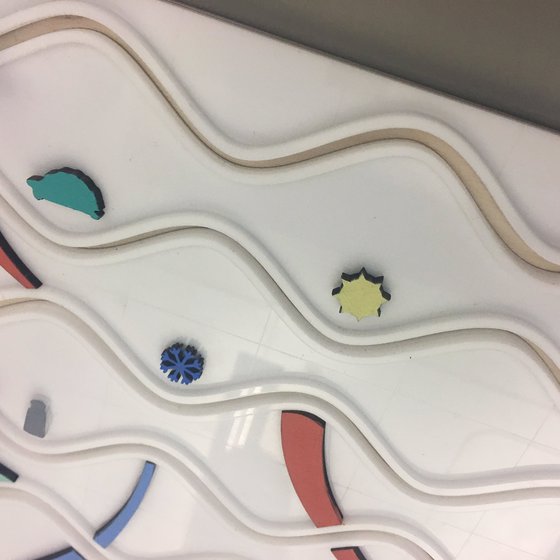 A close-up view of a board game with colorful pieces.