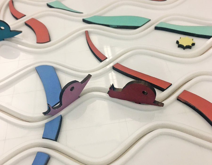 A close-up view of a board game with colorful pieces.