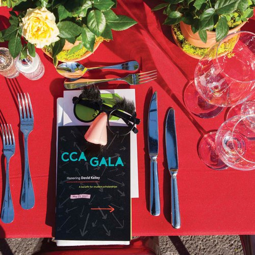 Gala table setting and printed event materials.