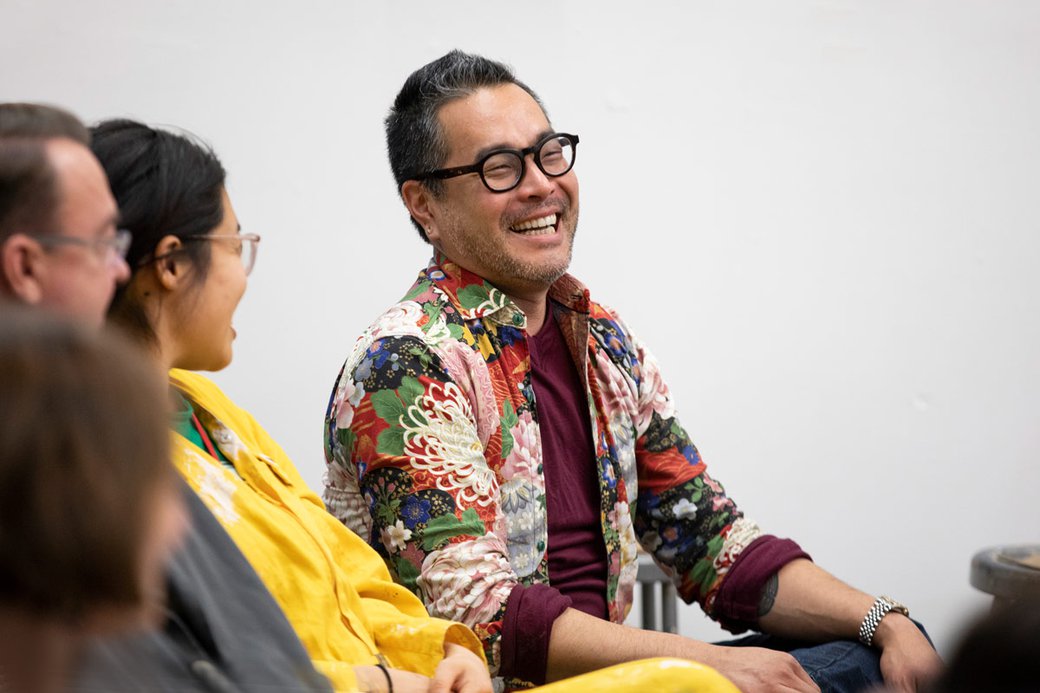 Curtis Arima laughing at a Ceramics meeting