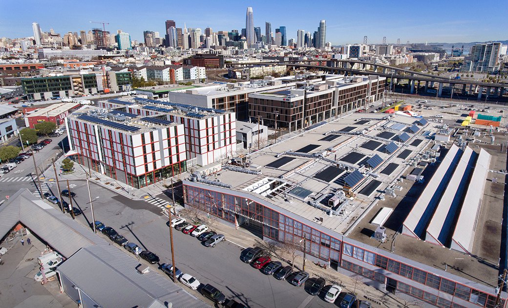 Aerial view of CCA campus with the San Francisco skyline in the background