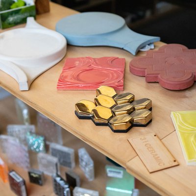 An assembly of small material samples on shelves.