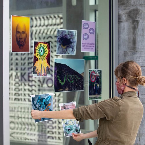 Jaime Austin, director of Exhibitions and Public Programming, curates the window activation at CCA’s Hubbell Street Galleries.