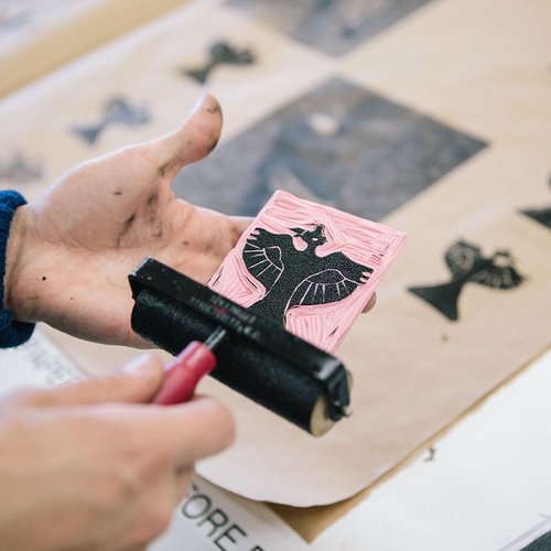 Rollers are a quick way to apply ink to hand-carved woodblocks.