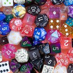 A close-up image of different types of dice used in games.