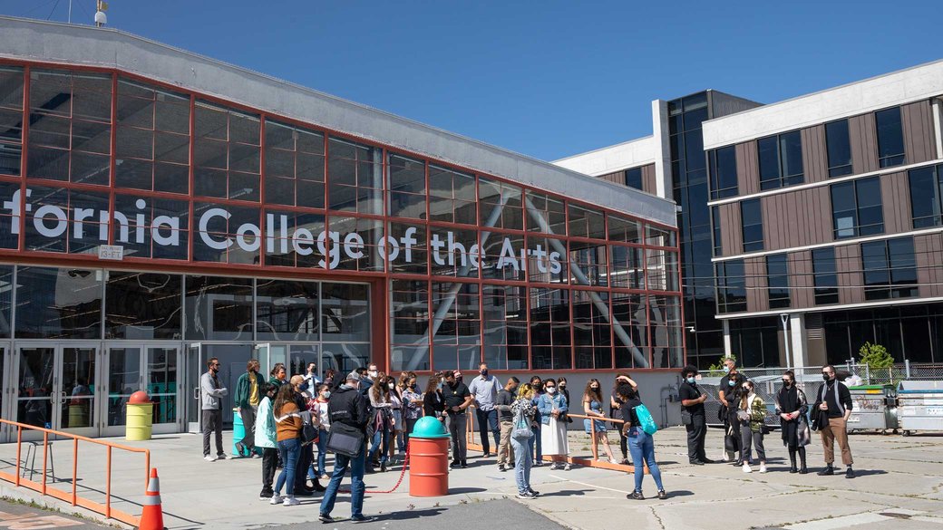 Students view the back of the Main Building.