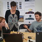 CCA student team around table discussing Audi Design Challenge