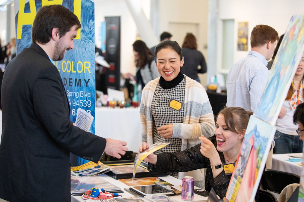 Students connecting with industry representatives at the career fair.
