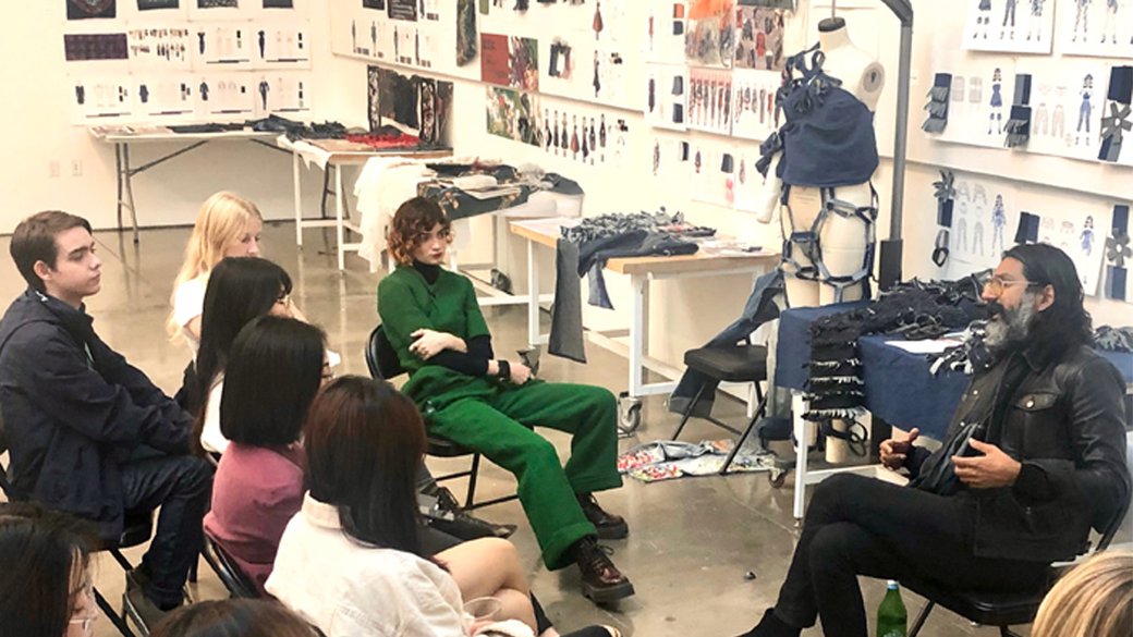 Omar Nobil, VP of Women's Design at Banana Republic giving feedback to fashion design students.