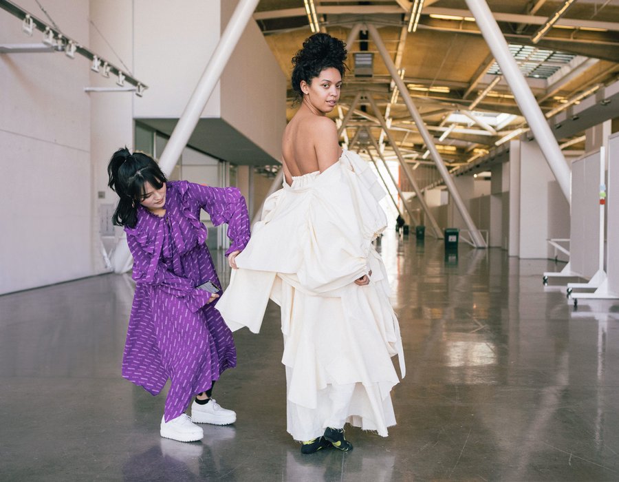 Senior fashion student working with a model in the Nave.
