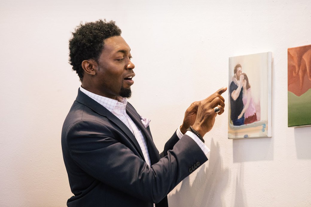 Keith Thomas offers his expert insights to painting students during a critique.