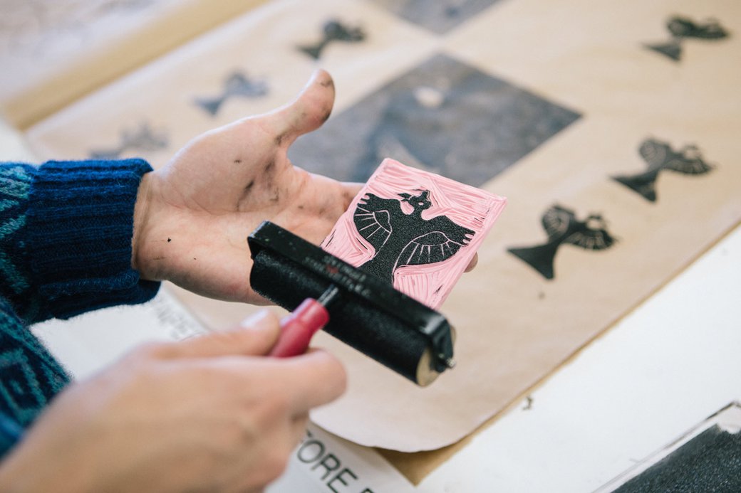 CCA Screenprinting student learning to etch, ink, and press lithographs